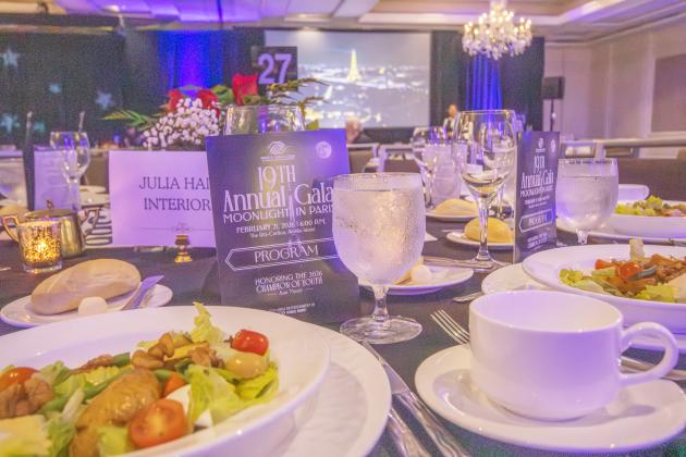 The catered meal provided to attendees of the gala.