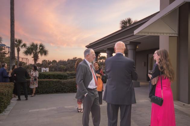 Gala attendees enjoy sunset views at the Ritz Carlton resort on Amelia Island. By Marisa DeMar/News-Leader 