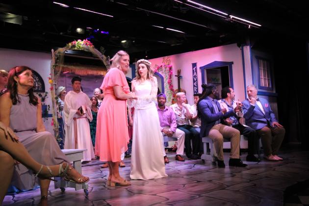 The cast during act two of Mamma Mia. By Marisa DeMar