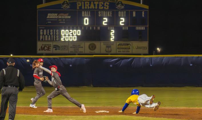 Trace Farmer steals second base in a game against Baldwin. Photo by Ashley Chandler/News-Leader