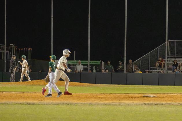 Yulee High’s Daylon Adams rounds second base following his second home run of the night against Parsons. Photo by Ashley Chandler/News-Leader