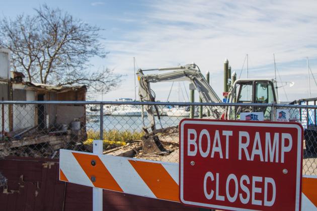 Atlantic Seafood partially demolished Wednesday at the Downtown Fernandina Beach Marina. Photo by Ashley Chandler/News-Leader