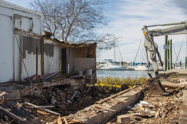 Atlantic Seafood partially demolished Wednesday at the Downtown Fernandina Beach Marina. Photo by Ashley Chandler/News-Leader
