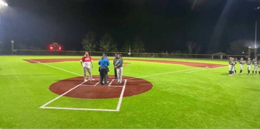 Head coach Cristyn Camp, right, at the plate meeting ahead of Yulee High School’s Tuesday’s preseason game against Bishop Snyder. Submitted photo