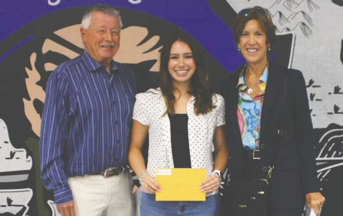 Fernandina Beach High School’s Anna Ross, a 2025 scholarship winner, stands with I4E Co-founder John Elwell and board member Claudia Watts. Submitted photo