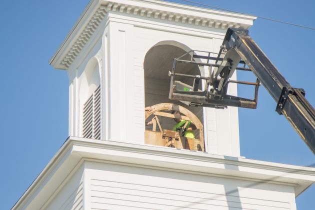 Workers from White’s Clock &amp; Carillon removed the bell from the belfry at First Presbyterian Church on 6th Street in downtown Fernandian Beach. The bell was first hung in 1859. Photo by Ashley Chandler/News-Leader