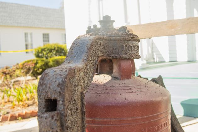 Workers from White’s Clock &amp; Carillon removed the bell from the belfry at First Presbyterian Church on 6th Street in downtown Fernandian Beach. The bell was first hung in 1859. Photo by Ashley Chandler/News-Leader