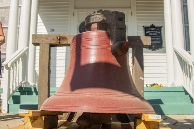 Workers from White’s Clock &amp; Carillon removed the bell from the belfry at First Presbyterian Church on 6th Street in downtown Fernandian Beach. The bell was first hung in 1859. Photo by Ashley Chandler/News-Leader