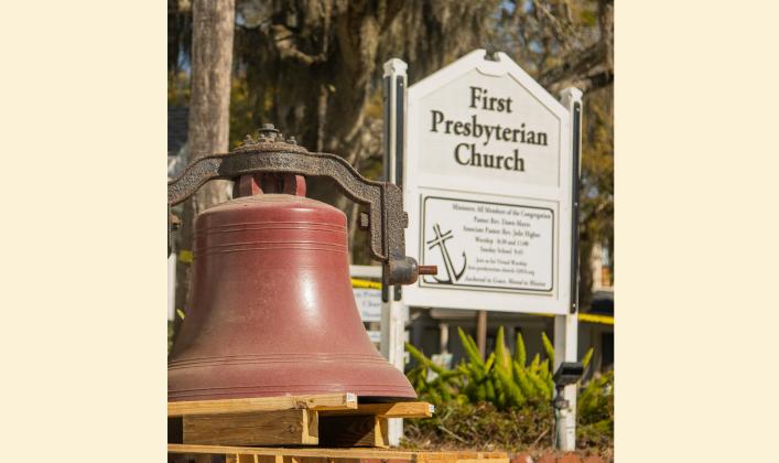 Workers from White’s Clock &amp; Carillon removed the bell from the belfry at First Presbyterian Church on 6th Street in downtown Fernandian Beach. The bell was first hung in 1859. Photo by Ashley Chandler/News-Leader