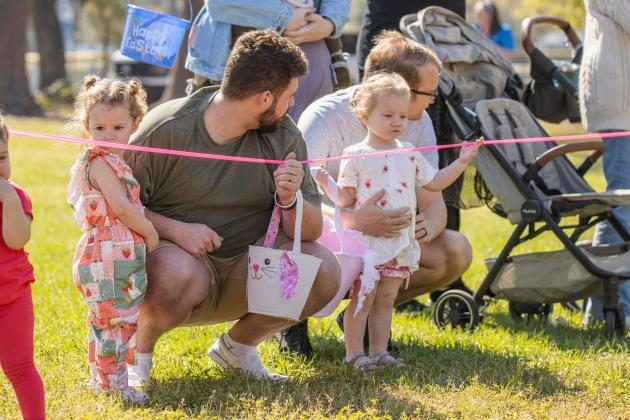 Thousands of colorful plastic eggs were scattered at Central Park on Saturday for local children to gather as part of Fernandina Beach’s second annual Easter Egg Hunt. Photo by Ashley Chandler/News-Leader