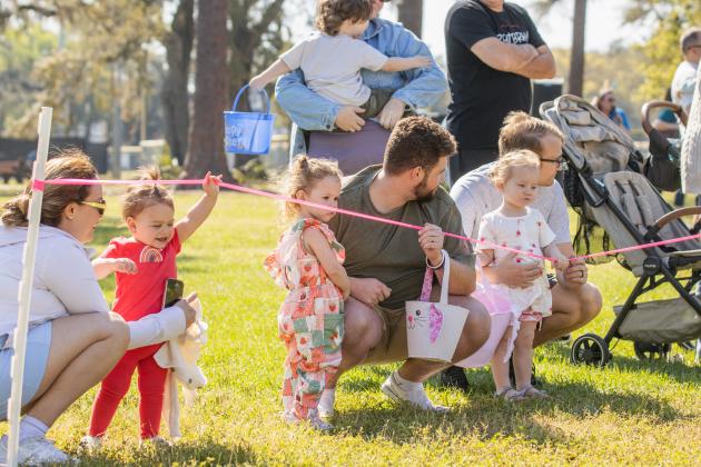 Thousands of colorful plastic eggs were scattered at Central Park on Saturday for local children to gather as part of Fernandina Beach’s second annual Easter Egg Hunt. Photo by Ashley Chandler/News-Leader