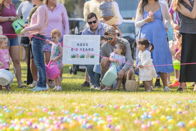 Thousands of colorful plastic eggs were scattered at Central Park on Saturday for local children to gather as part of Fernandina Beach’s second annual Easter Egg Hunt. Photo by Ashley Chandler/News-Leader
