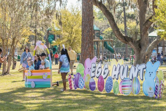 Thousands of colorful plastic eggs were scattered at Central Park on Saturday for local children to gather as part of Fernandina Beach’s second annual Easter Egg Hunt. Photo by Ashley Chandler/News-Leader