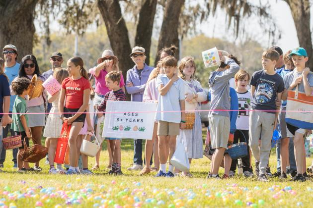 Thousands of colorful plastic eggs were scattered at Central Park on Saturday for local children to gather as part of Fernandina Beach’s second annual Easter Egg Hunt. Photo by Ashley Chandler/News-Leader