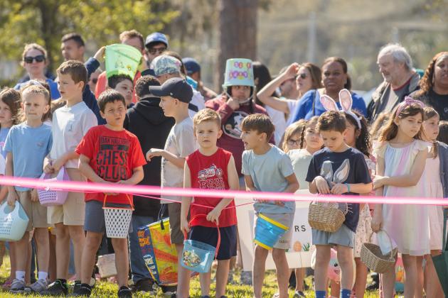 Thousands of colorful plastic eggs were scattered at Central Park on Saturday for local children to gather as part of Fernandina Beach’s second annual Easter Egg Hunt. Photo by Ashley Chandler/News-Leader