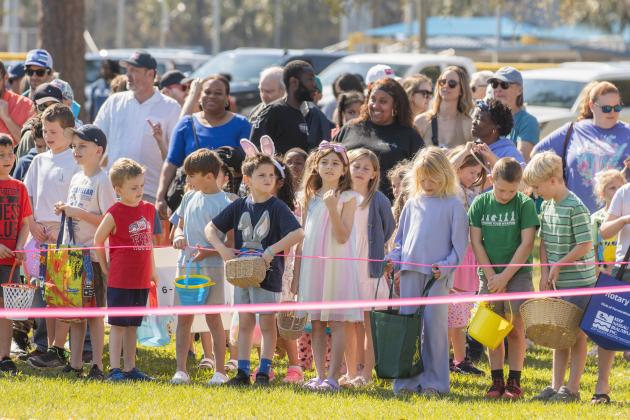 Thousands of colorful plastic eggs were scattered at Central Park on Saturday for local children to gather as part of Fernandina Beach’s second annual Easter Egg Hunt. Photo by Ashley Chandler/News-Leader