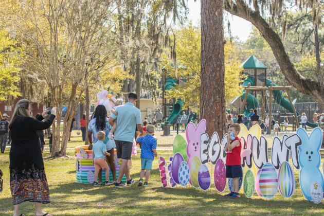 Thousands of colorful plastic eggs were scattered at Central Park on Saturday for local children to gather as part of Fernandina Beach’s second annual Easter Egg Hunt. Photo by Ashley Chandler/News-Leader