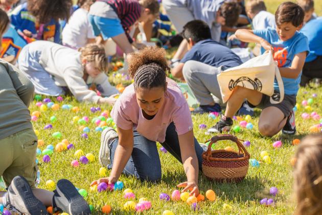 Thousands of colorful plastic eggs were scattered at Central Park on Saturday for local children to gather as part of Fernandina Beach’s second annual Easter Egg Hunt. Photo by Ashley Chandler/News-Leader