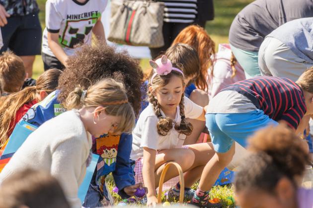 Thousands of colorful plastic eggs were scattered at Central Park on Saturday for local children to gather as part of Fernandina Beach’s second annual Easter Egg Hunt. Photo by Ashley Chandler/News-Leader