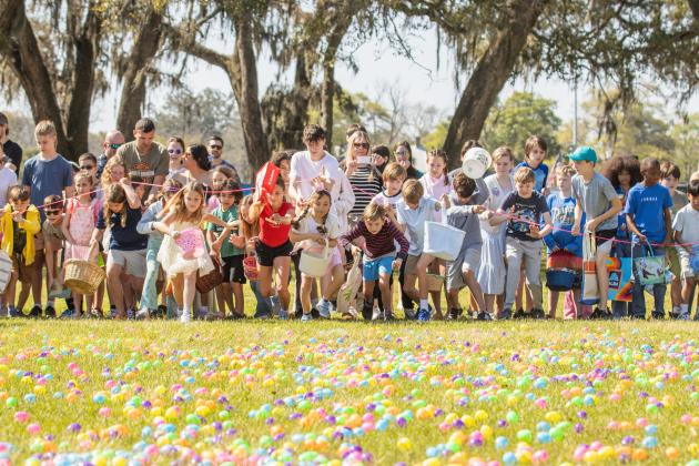 Thousands of colorful plastic eggs were scattered at Central Park on Saturday for local children to gather as part of Fernandina Beach’s second annual Easter Egg Hunt. Photo by Ashley Chandler/News-Leader