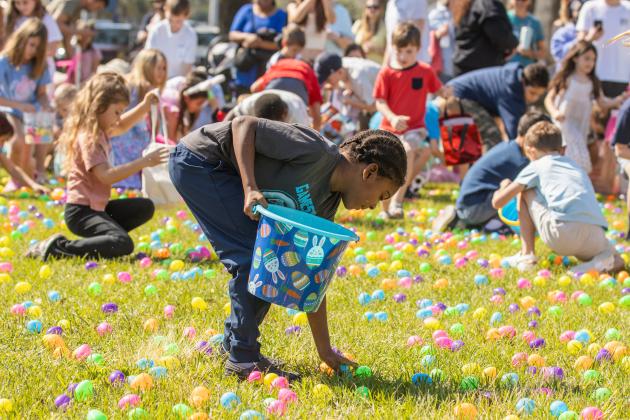 Thousands of colorful plastic eggs were scattered at Central Park on Saturday for local children to gather as part of Fernandina Beach’s second annual Easter Egg Hunt. Photo by Ashley Chandler/News-Leader