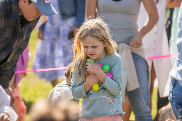 Thousands of colorful plastic eggs were scattered at Central Park on Saturday for local children to gather as part of Fernandina Beach’s second annual Easter Egg Hunt. Photo by Ashley Chandler/News-Leader