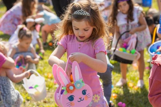 Thousands of colorful plastic eggs were scattered at Central Park on Saturday for local children to gather as part of Fernandina Beach’s second annual Easter Egg Hunt. Photo by Ashley Chandler/News-Leader