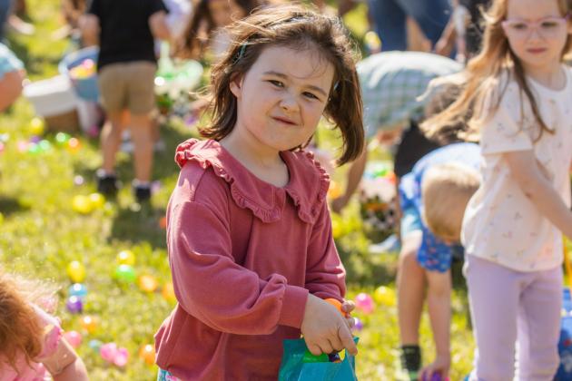Thousands of colorful plastic eggs were scattered at Central Park on Saturday for local children to gather as part of Fernandina Beach’s second annual Easter Egg Hunt. Photo by Ashley Chandler/News-Leader