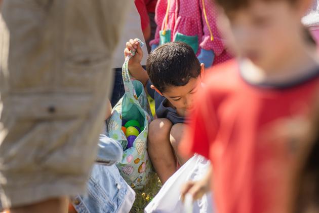 Thousands of colorful plastic eggs were scattered at Central Park on Saturday for local children to gather as part of Fernandina Beach’s second annual Easter Egg Hunt. Photo by Ashley Chandler/News-Leader