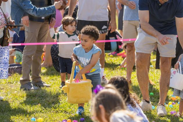 Thousands of colorful plastic eggs were scattered at Central Park on Saturday for local children to gather as part of Fernandina Beach’s second annual Easter Egg Hunt. Photo by Ashley Chandler/News-Leader