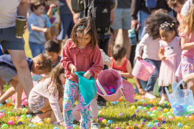Thousands of colorful plastic eggs were scattered at Central Park on Saturday for local children to gather as part of Fernandina Beach’s second annual Easter Egg Hunt. Photo by Ashley Chandler/News-Leader