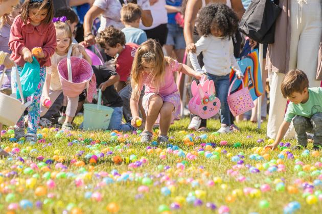 Thousands of colorful plastic eggs were scattered at Central Park on Saturday for local children to gather as part of Fernandina Beach’s second annual Easter Egg Hunt. Photo by Ashley Chandler/News-Leader