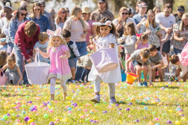 Thousands of colorful plastic eggs were scattered at Central Park on Saturday for local children to gather as part of Fernandina Beach’s second annual Easter Egg Hunt. Photo by Ashley Chandler/News-Leader