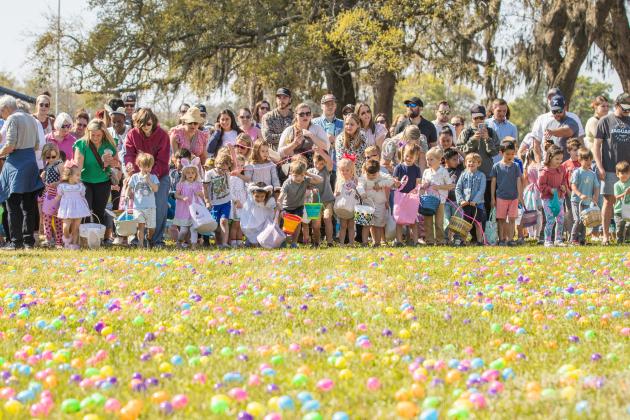 Thousands of colorful plastic eggs were scattered at Central Park on Saturday for local children to gather as part of Fernandina Beach’s second annual Easter Egg Hunt. Photo by Ashley Chandler/News-Leader