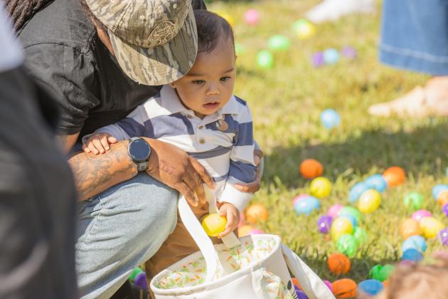 Thousands of colorful plastic eggs were scattered at Central Park on Saturday for local children to gather as part of Fernandina Beach’s second annual Easter Egg Hunt. Photo by Ashley Chandler/News-Leader