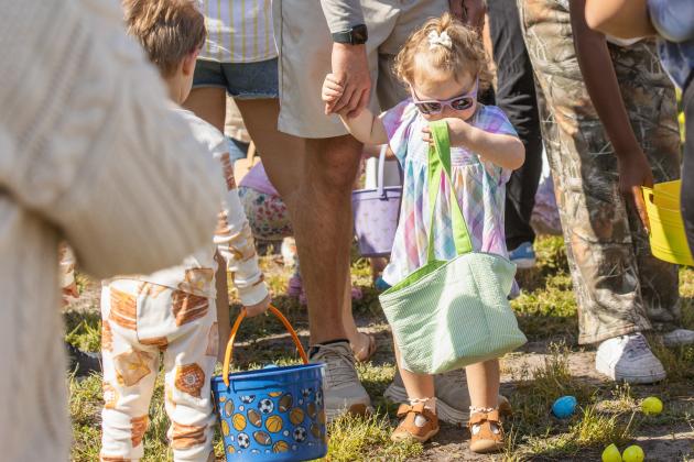 Thousands of colorful plastic eggs were scattered at Central Park on Saturday for local children to gather as part of Fernandina Beach’s second annual Easter Egg Hunt. Photo by Ashley Chandler/News-Leader