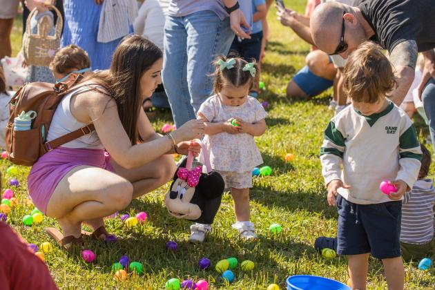 Thousands of colorful plastic eggs were scattered at Central Park on Saturday for local children to gather as part of Fernandina Beach’s second annual Easter Egg Hunt. Photo by Ashley Chandler/News-Leader