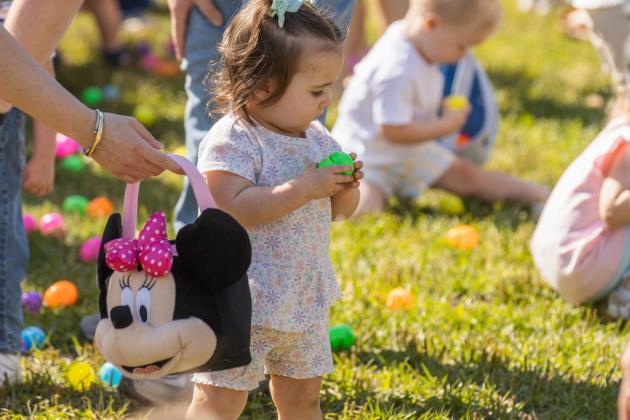 Thousands of colorful plastic eggs were scattered at Central Park on Saturday for local children to gather as part of Fernandina Beach’s second annual Easter Egg Hunt. Photo by Ashley Chandler/News-Leader
