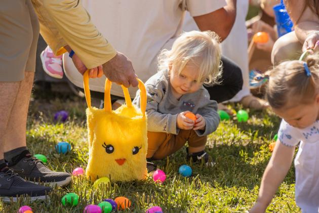 Thousands of colorful plastic eggs were scattered at Central Park on Saturday for local children to gather as part of Fernandina Beach’s second annual Easter Egg Hunt. Photo by Ashley Chandler/News-Leader