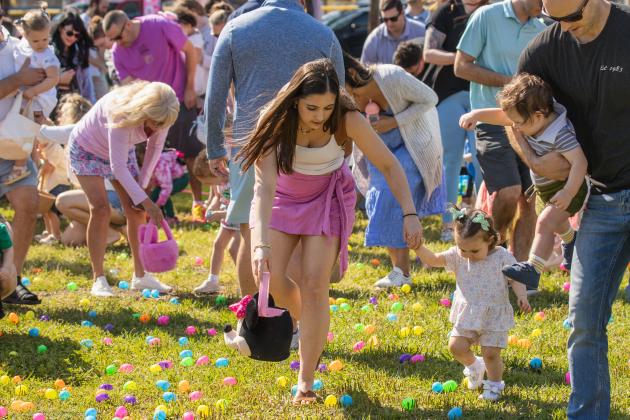 Thousands of colorful plastic eggs were scattered at Central Park on Saturday for local children to gather as part of Fernandina Beach’s second annual Easter Egg Hunt. Photo by Ashley Chandler/News-Leader