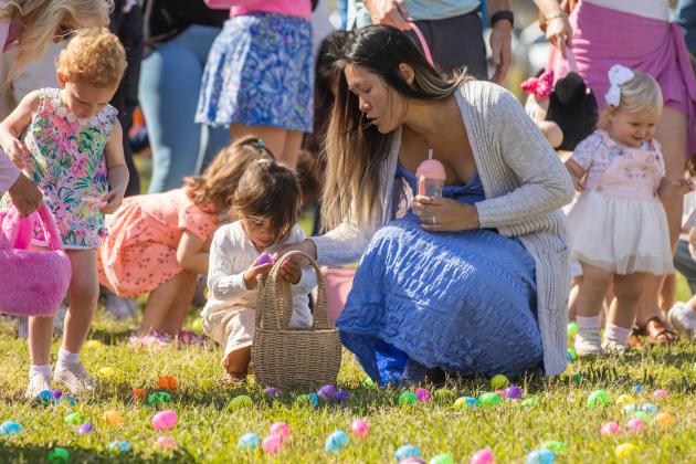 Thousands of colorful plastic eggs were scattered at Central Park on Saturday for local children to gather as part of Fernandina Beach’s second annual Easter Egg Hunt. Photo by Ashley Chandler/News-Leader