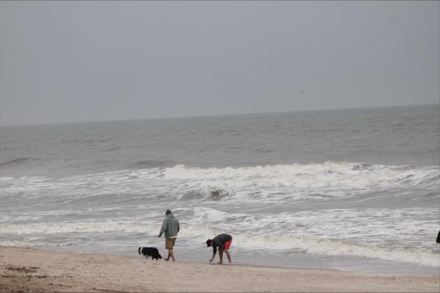 People on Main Beach on Thursday. Photo by Marisa DeMar/News-Leader