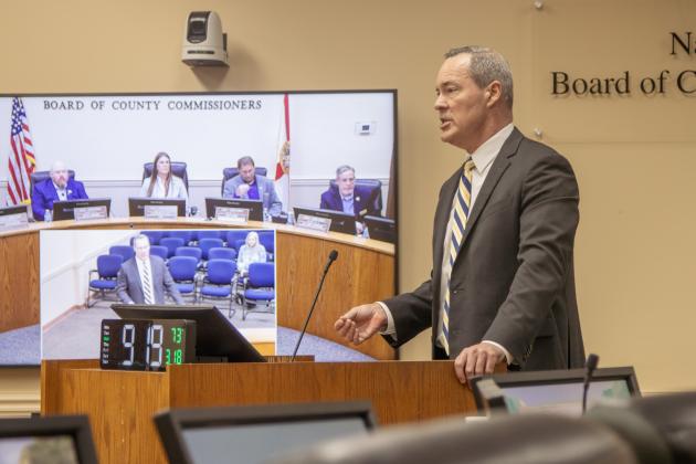 Ron Whitesides, of Purvis, Gray & Co., presents Wednesday to the Board of County Commissioners on the companies’ most recent audit of the BOCC and constitutional offices. Photo by Ashley Chandler/News-Leader