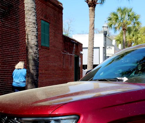 A paid parking ticker on a vehicle parked downtown Friday. Amy Mulligan/News-Leader
