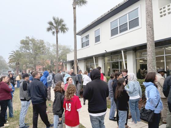 A crowd gathers outside City Hall on Tuesday evening. Nick Blank/News-Leader