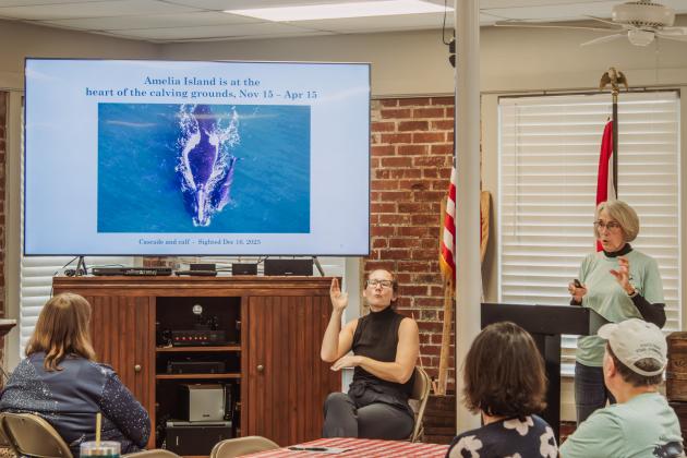 Theresa Hartz, member of the Amelia Island Whale Ambassadors, speaks during the Brown Bag Lunch held Wednesday at the Amelia Island Museum of History. Photo by Ashley Chandler/News-Leader
