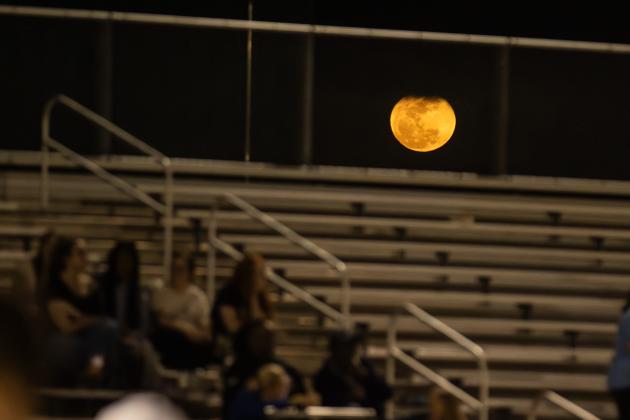 The moon rises over the Yulee High School bleechers on Wednesday at the football field and track. Photo by Ashley Chandler/News-Leader