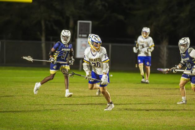 The Pirates lacrosse team beat Sandalwood 13-3 on Friday at FBHS. Photo by Ashley Chandler/News-Leader