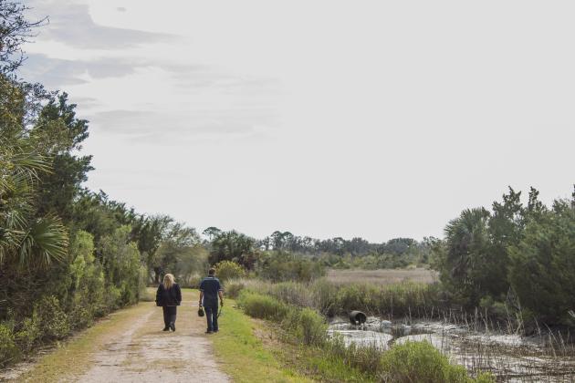 The Ron Sapp Egans Creek Greenway trail is a popular outdoor spot in Fernandina Beach. Unfortunately for those who suffer from allergies, the trail is booming with blooms on the trees and flowering plants as Nassau County welcomes Spring. Photo by Ashley Chandler/News-Leader