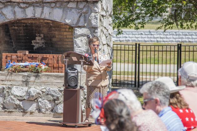 Jane Collins, past regent of the local DAR, reads the history of John Daniel Vaughan at Saturday’s America 250! event and wreath-laying ceremony. Photo by Ashley Chandler/News-Leader